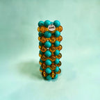 Soliflore perles ambre et vert by Nini